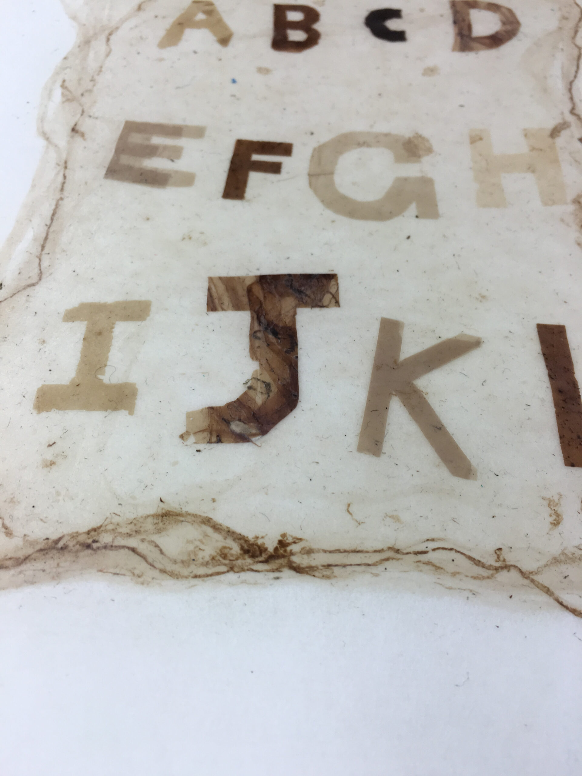 4 separate layers of text, 5 layers of paper. all compressed into a single sheet